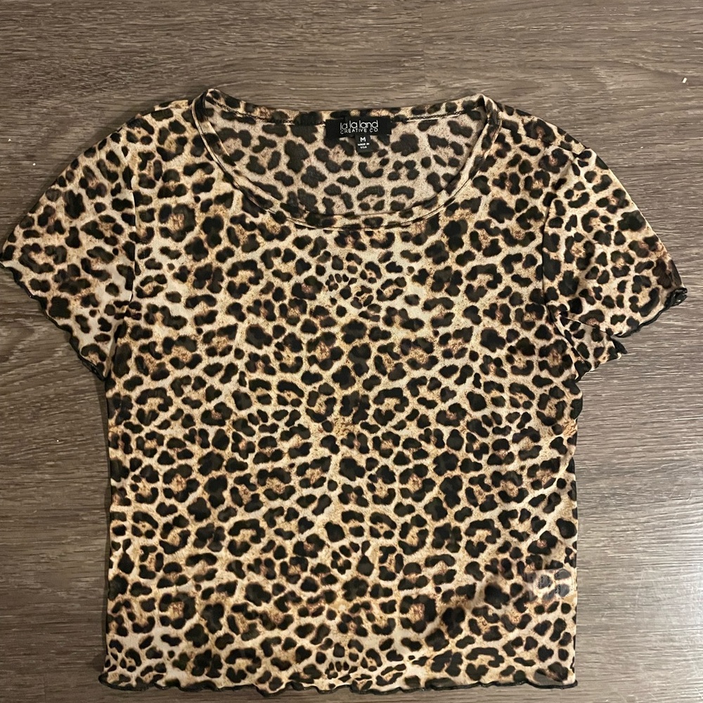 Leopard / cheetah print crop top, slightly sheer. Size M